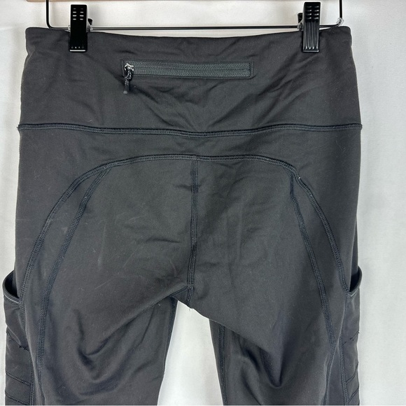 Lululemon Womens Size 6 Speed Tight Solid Black Reflective Pockets - Picture 6 of 9